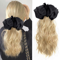Black bow-Blonde